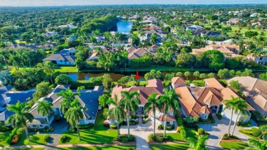 Lovely 5-bedroom + office home with southern exposure, located on St. Andrews Country Club of Boca Raton in Florida - for sale on GolfHomes.com, golf home, golf lot