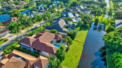 Lovely 5-bedroom + office home with southern exposure, located on St. Andrews Country Club of Boca Raton in Florida - for sale on GolfHomes.com, golf home, golf lot