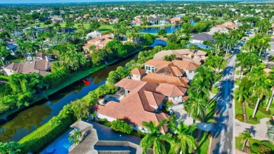 Lovely 5-bedroom + office home with southern exposure, located on St. Andrews Country Club of Boca Raton in Florida - for sale on GolfHomes.com, golf home, golf lot