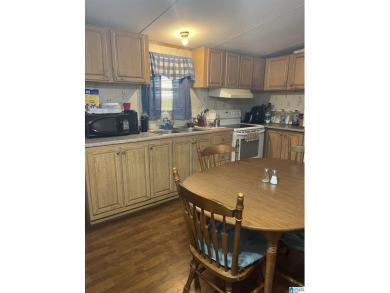 Incredible opportunity waiting for you! Mobile home has 3 on Robert Trent Jones - Oxmoor Valley Golf Course in Alabama - for sale on GolfHomes.com, golf home, golf lot