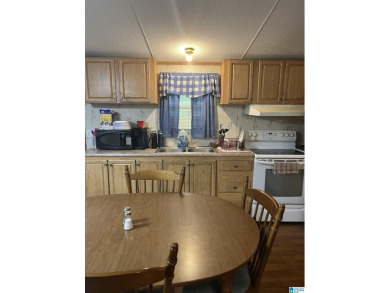 Incredible opportunity waiting for you! Mobile home has 3 on Robert Trent Jones - Oxmoor Valley Golf Course in Alabama - for sale on GolfHomes.com, golf home, golf lot