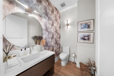 Meridian Lofts Residence #411 is a sleek 2-bed, 2.5-bath on Miami Beach Golf Club in Florida - for sale on GolfHomes.com, golf home, golf lot
