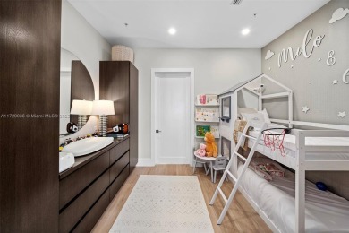 Meridian Lofts Residence #411 is a sleek 2-bed, 2.5-bath on Miami Beach Golf Club in Florida - for sale on GolfHomes.com, golf home, golf lot