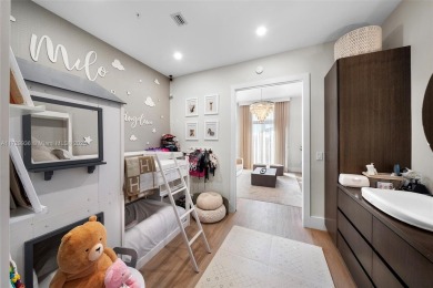 Meridian Lofts Residence #411 is a sleek 2-bed, 2.5-bath on Miami Beach Golf Club in Florida - for sale on GolfHomes.com, golf home, golf lot