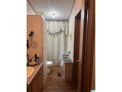 Incredible opportunity waiting for you! Mobile home has 3 on Robert Trent Jones - Oxmoor Valley Golf Course in Alabama - for sale on GolfHomes.com, golf home, golf lot