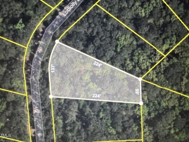 This .51 acres is located in the gated Woodlake Country Club on Woodlake Country Club in North Carolina - for sale on GolfHomes.com, golf home, golf lot