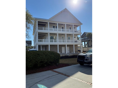 Welcome to luxury coastal living at its finest. Located in the on Surf Golf and Beach Club in South Carolina - for sale on GolfHomes.com, golf home, golf lot