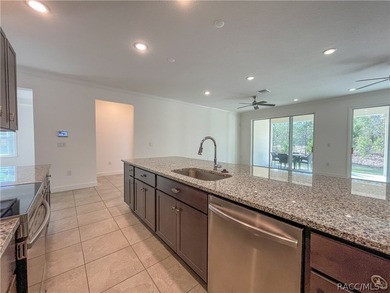 Move-in ready and situated on a desirable corner double lot on Sugarmill Woods Golf and Country Club in Florida - for sale on GolfHomes.com, golf home, golf lot