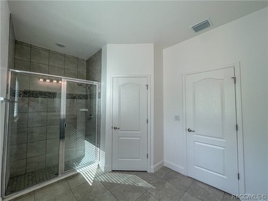 Move-in ready and situated on a desirable corner double lot on Sugarmill Woods Golf and Country Club in Florida - for sale on GolfHomes.com, golf home, golf lot