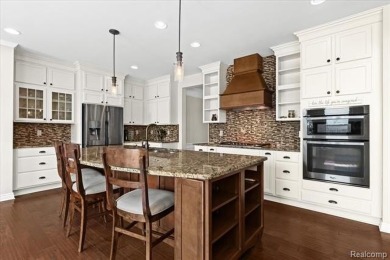 This stunning and spacious four bedroom colonial is located on a on Tanglewood Golf Club in Michigan - for sale on GolfHomes.com, golf home, golf lot