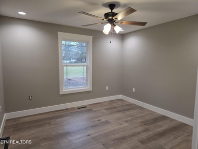 2 lots on Golf Course, 2 bedroom with bonus room, 2 bath, open on Lake Tansi Village Country Club in Tennessee - for sale on GolfHomes.com, golf home, golf lot