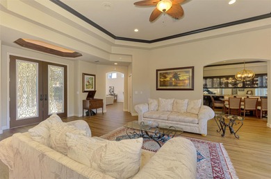 Under contract-accepting backup offers. EMBRACE THE 3 L's IN on Laurel Oak Country Club in Florida - for sale on GolfHomes.com, golf home, golf lot