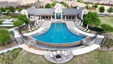 Discover the epitome of lakeside living in this stunning Perry on The Tribute At the Colony in Texas - for sale on GolfHomes.com, golf home, golf lot