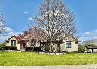 Greetings from this beautiful home at Woodridge Farms, adjacent on Copper Ridge Golf Club in Michigan - for sale on GolfHomes.com, golf home, golf lot