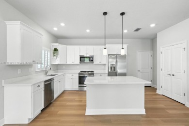 Welcome Home to luxury in this 2BD/2BA/2CG cottage home on an on Venetian Bay Golf Course in Florida - for sale on GolfHomes.com, golf home, golf lot