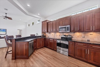 Under contract-accepting backup offers. EMBRACE THE 3 L's IN on Laurel Oak Country Club in Florida - for sale on GolfHomes.com, golf home, golf lot