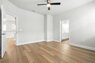 Welcome Home to luxury in this 2BD/2BA/2CG cottage home on an on Venetian Bay Golf Course in Florida - for sale on GolfHomes.com, golf home, golf lot