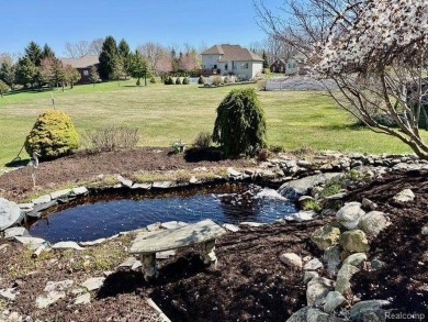 Greetings from this beautiful home at Woodridge Farms, adjacent on Copper Ridge Golf Club in Michigan - for sale on GolfHomes.com, golf home, golf lot