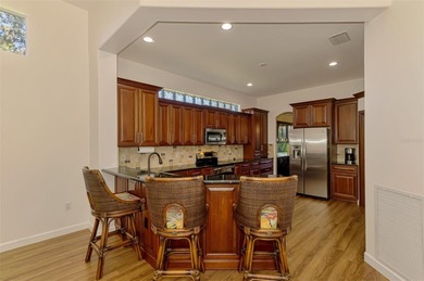 Under contract-accepting backup offers. EMBRACE THE 3 L's IN on Laurel Oak Country Club in Florida - for sale on GolfHomes.com, golf home, golf lot