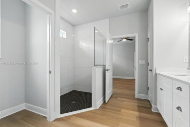 Welcome Home to luxury in this 2BD/2BA/2CG cottage home on an on Venetian Bay Golf Course in Florida - for sale on GolfHomes.com, golf home, golf lot
