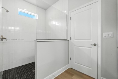 Welcome Home to luxury in this 2BD/2BA/2CG cottage home on an on Venetian Bay Golf Course in Florida - for sale on GolfHomes.com, golf home, golf lot