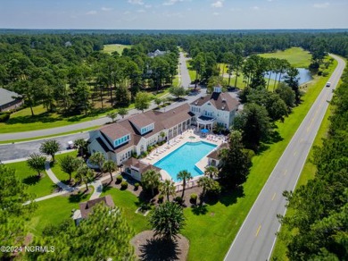 This exceptional home site is situated in the prestigious Rivers on Rivers Edge Golf Club in North Carolina - for sale on GolfHomes.com, golf home, golf lot