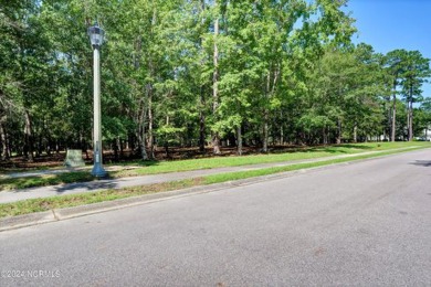 This exceptional home site is situated in the prestigious Rivers on Rivers Edge Golf Club in North Carolina - for sale on GolfHomes.com, golf home, golf lot