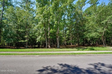 This exceptional home site is situated in the prestigious Rivers on Rivers Edge Golf Club in North Carolina - for sale on GolfHomes.com, golf home, golf lot