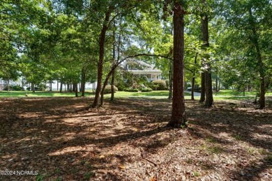 This exceptional home site is situated in the prestigious Rivers on Rivers Edge Golf Club in North Carolina - for sale on GolfHomes.com, golf home, golf lot