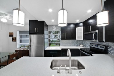 Step into this meticulously updated 2-bedroom, 2-bathroom condo on Kings Point Golf -Flanders Way in Florida - for sale on GolfHomes.com, golf home, golf lot