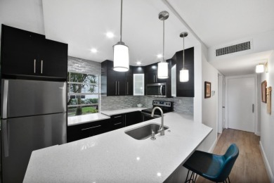 Step into this meticulously updated 2-bedroom, 2-bathroom condo on Kings Point Golf -Flanders Way in Florida - for sale on GolfHomes.com, golf home, golf lot