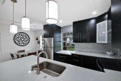Step into this meticulously updated 2-bedroom, 2-bathroom condo on Kings Point Golf -Flanders Way in Florida - for sale on GolfHomes.com, golf home, golf lot