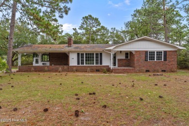 Take note of this nicely renovated 3 bedroom, 2 bath home in on The Lakes Country Club in North Carolina - for sale on GolfHomes.com, golf home, golf lot