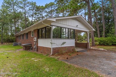 Take note of this nicely renovated 3 bedroom, 2 bath home in on The Lakes Country Club in North Carolina - for sale on GolfHomes.com, golf home, golf lot