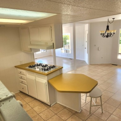 This property is light, bright and has a unique 2 bed/2 bath on Palm Desert Greens Country Club in California - for sale on GolfHomes.com, golf home, golf lot