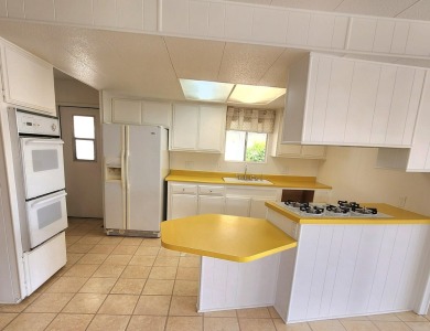 This property is light, bright and has a unique 2 bed/2 bath on Palm Desert Greens Country Club in California - for sale on GolfHomes.com, golf home, golf lot
