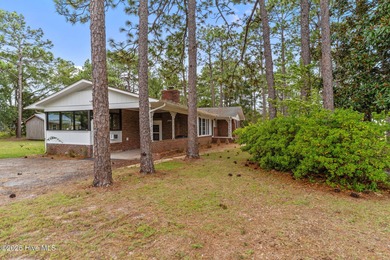 Take note of this nicely renovated 3 bedroom, 2 bath home in on The Lakes Country Club in North Carolina - for sale on GolfHomes.com, golf home, golf lot