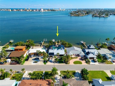 Secluded within the exclusive Boca Ciega Isle neighborhood, this on Isla Del Sol Yacht and Country Club in Florida - for sale on GolfHomes.com, golf home, golf lot