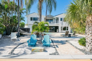Secluded within the exclusive Boca Ciega Isle neighborhood, this on Isla Del Sol Yacht and Country Club in Florida - for sale on GolfHomes.com, golf home, golf lot