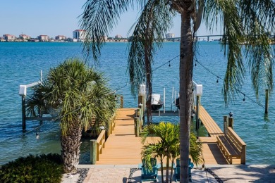 Secluded within the exclusive Boca Ciega Isle neighborhood, this on Isla Del Sol Yacht and Country Club in Florida - for sale on GolfHomes.com, golf home, golf lot
