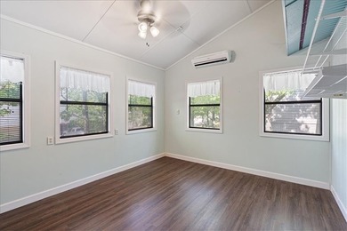 Discover this charming two bedroom town home nestled on Holiday on Holiday Island Executive Golf Course in Arkansas - for sale on GolfHomes.com, golf home, golf lot