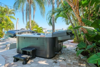 Secluded within the exclusive Boca Ciega Isle neighborhood, this on Isla Del Sol Yacht and Country Club in Florida - for sale on GolfHomes.com, golf home, golf lot