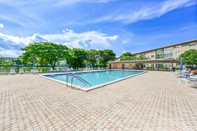 Welcome to the Gated community of Wynmoor. This Beautiful on Wynmoor Golf Course in Florida - for sale on GolfHomes.com, golf home, golf lot