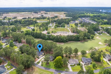 Welcome to this custom-built home situated in a park-like on Meadowlands Golf Club in North Carolina - for sale on GolfHomes.com, golf home, golf lot