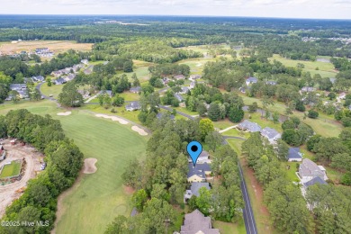 Welcome to this custom-built home situated in a park-like on Meadowlands Golf Club in North Carolina - for sale on GolfHomes.com, golf home, golf lot