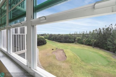 Enjoy golf views from a private screened patio in this updated on Palm-Aire Country Club and Resort - The Oaks in Florida - for sale on GolfHomes.com, golf home, golf lot