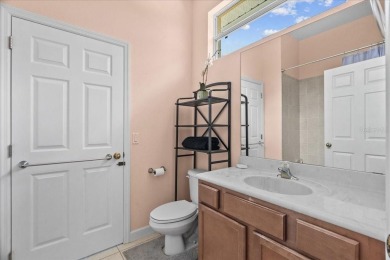 Discover your ideal Lakefront Pool Home at the end of a quiet on Oaks National Golf Course in Florida - for sale on GolfHomes.com, golf home, golf lot