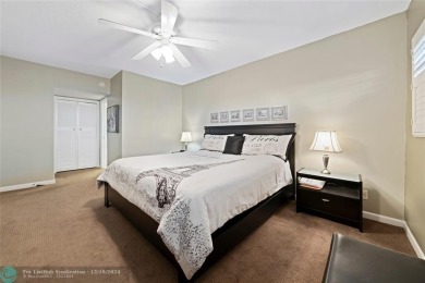 Enjoy golf views from a private screened patio in this updated on Palm-Aire Country Club and Resort - The Oaks in Florida - for sale on GolfHomes.com, golf home, golf lot