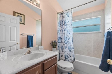 Discover your ideal Lakefront Pool Home at the end of a quiet on Oaks National Golf Course in Florida - for sale on GolfHomes.com, golf home, golf lot