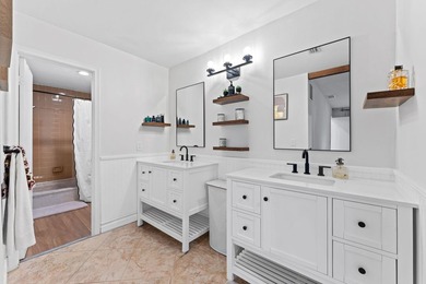 Welcome to this beautifully maintained 3-bedroom, 2-bathroom on Woodmont Country Club in Florida - for sale on GolfHomes.com, golf home, golf lot